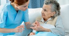Nurse helping with medication